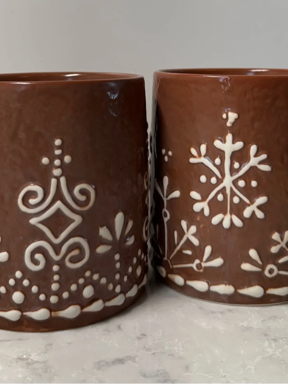 Pottery Barn Brown Ceramic Mug with White Snowflake Design